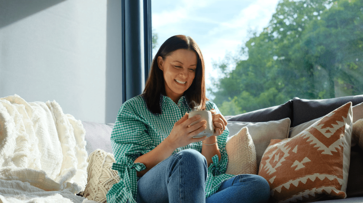 women holding mug